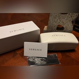 Hardshell glasses case by Versace and it’s original box with cloth